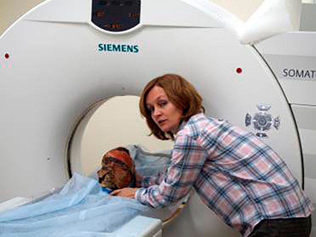 Svetlana Pankova puts the male head into CT scaner